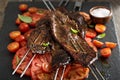 Flank steak on skewers with tomatoes Royalty Free Stock Photo