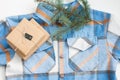 Flannelette warm plaid shirt with a gift and a Christmas tree. Royalty Free Stock Photo