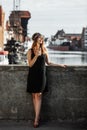 Flapper girl woman in1920s style standing on the street Royalty Free Stock Photo