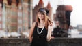 Flapper girl woman in1920s style standing on the street Royalty Free Stock Photo