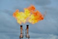 A flare stack burning off natural gas in North Dakota. Royalty Free Stock Photo