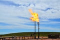 A flare stack burning off natural gas in North Dakota. Royalty Free Stock Photo