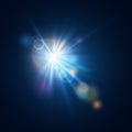 Flash burst of star light with blur and lens flare effect. Shining sun glow. Sparkling light of sun rays oNeon blue beam Royalty Free Stock Photo