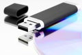 Flash drive memory and optical disc. Royalty Free Stock Photo