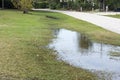 Flash flood in grassland at roadside in bonita springs florida Royalty Free Stock Photo