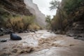 flash flood rushes through deep and winding canyon, with trees and rocks washed downstream Royalty Free Stock Photo