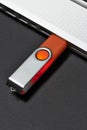 Flash memory drive plugged into a laptop port. Royalty Free Stock Photo