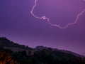 Flash in the sky above the landscape - long exposure at night Royalty Free Stock Photo