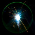 Flash and sparks from electric welding