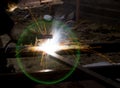 Flash and sparks from electric welding