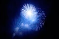Flashes of blue and white fireworks and blue smoke Royalty Free Stock Photo