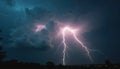 Flashes of bright lightning split dark stormy clouds over silhouette of trees and distant town lights. Dramatic natural storm Royalty Free Stock Photo
