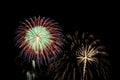 Flashes of fireworks against the black sky Royalty Free Stock Photo