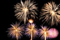 Flashes of fireworks of white, yellow, pink and blue colors Royalty Free Stock Photo