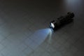 Flashlight and a beam of light Royalty Free Stock Photo