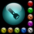 Flashlight icons in color illuminated glass buttons