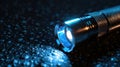 A flashlight laying on a wet surface, suitable for emergency or outdoor themes Royalty Free Stock Photo