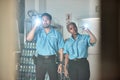 Flashlight, police and man and woman for investigation, inspection and property search at night. Surveillance team, law