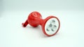 Flashlight in red color body on white back ground Royalty Free Stock Photo
