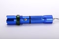 Flashlight Torch blue metal outdoor use. Royalty Free Stock Photo