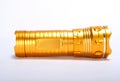 Flashlight Torch yellow metal Royalty Free Stock Photo