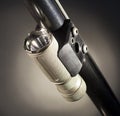 Flashlight under a shotgun barrel Royalty Free Stock Photo