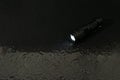 Flashlight water resistant in drops Royalty Free Stock Photo