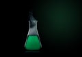 Flask with green liquid