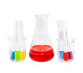Flask and test tubes with solution in small beaker Royalty Free Stock Photo