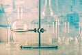 Flasks, test tubes and other chemical glassware on a blue background Royalty Free Stock Photo