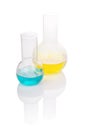 Flasks with yellow and blue chemical liquid