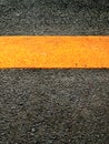 Flat asphalt road with yellow dividing line
