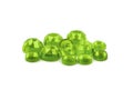 Flat back peridot cabochons on a white background