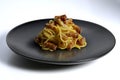Flat black plate with spaghetti carbonara Royalty Free Stock Photo