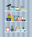 Flat bookshelves with colorful objects - books, plants, stationery, telescope and a photo frame
