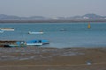 Flat bottom boats in Jebudo island harbor at low tide Royalty Free Stock Photo