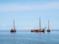 Flat bottom sailboats drying out at low tide on Waddensea near H Royalty Free Stock Photo