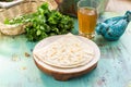 Flat bread qutab on blue wooden table traditional Azerbaijani cuisine