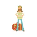 Flat cartoon bearded man hippie standing with arms akimbo near retro suitcase. Happy male in classic sixties hippy