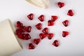 Flat closed red small crystals hearts on white background