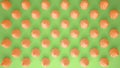 Flat colorful pop art composition with orange party cupcakes, bakery goodies, on green background, pattern texture copy space