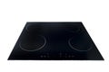 Flat cooktop cooking induction electric built black stove. Electric induction hob with ceramic tempered glass surface Royalty Free Stock Photo