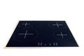 Flat cooktop cooking induction electric built black stove. Electric induction hob with ceramic tempered glass surface Royalty Free Stock Photo