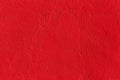 Flat deep red chili pepper color plaster wall matte texture