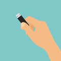 Flat design cartoon illustration of hand holding USB flash drive, vector Royalty Free Stock Photo