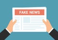 Flat design illustration of manager`s hands holding newspaper and reading fake news, vector Royalty Free Stock Photo