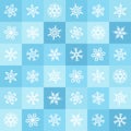 Flat design snowflakes and squares winter seamless pattern. Royalty Free Stock Photo