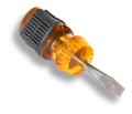 Translucent yellow flat headed screwdriver with rubber grip and shadow Royalty Free Stock Photo