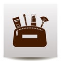 Flat icon of cosmetic products in a make up bag on a realistic p Royalty Free Stock Photo