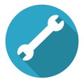 Flat icon white wrench in blue circle Royalty Free Stock Photo